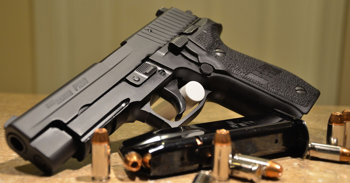 The SIG-Sauer P226 Decocking Double–action Auto Pistol – GunTray